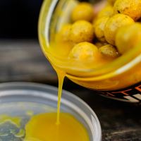 Munch Baits Boosterované Boilies Citrus Nut Boosted Hookbaits 200 ml (2)